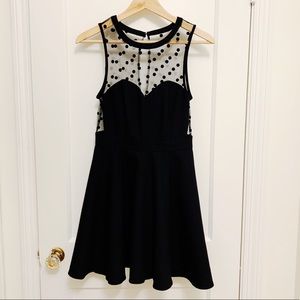 Little black dress with polka dot detail